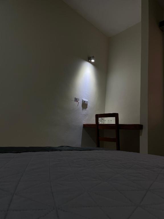 Postel nebo postele na pokoji v ubytování Hotel Pastora