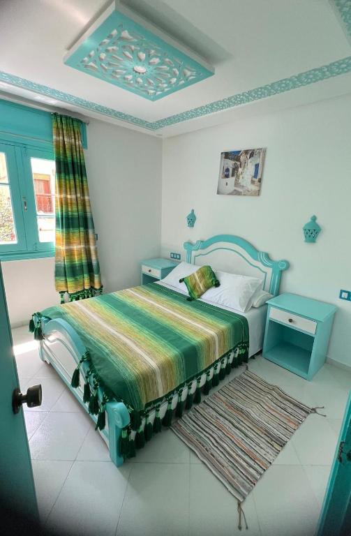 Postel nebo postele na pokoji v ubytování Hôtel Etoile de Mer
