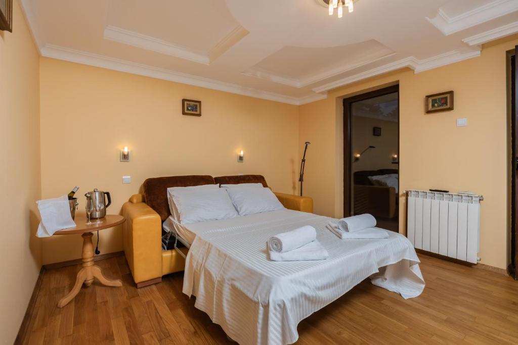 Letto o letti in una camera di Villa Botanicus
