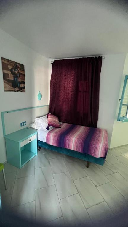 Postel nebo postele na pokoji v ubytování Hôtel Etoile de Mer