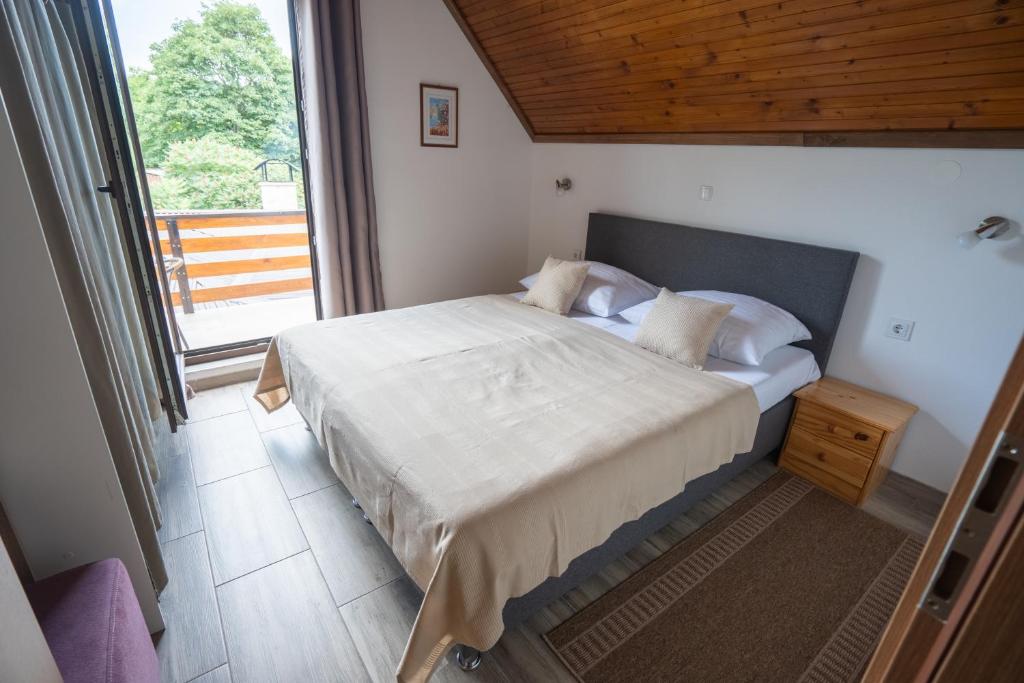 Postel nebo postele na pokoji v ubytování Apartment Ivanka
