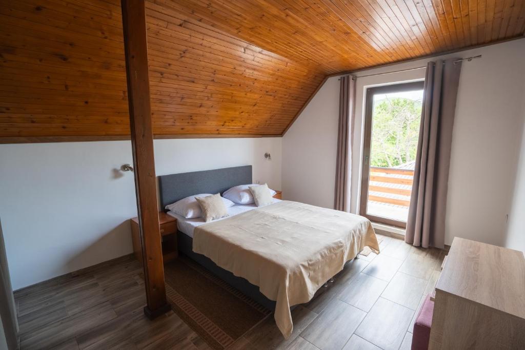 Postel nebo postele na pokoji v ubytování Apartment Ivanka