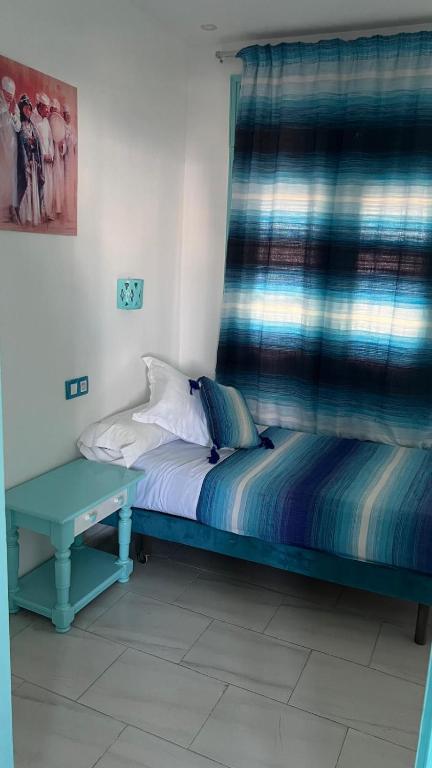 Postel nebo postele na pokoji v ubytování Hôtel Etoile de Mer