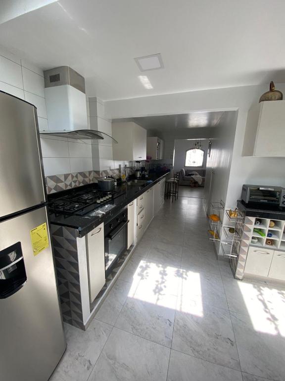Kuchyň nebo kuchyňský kout v ubytování Habitación casa Andy