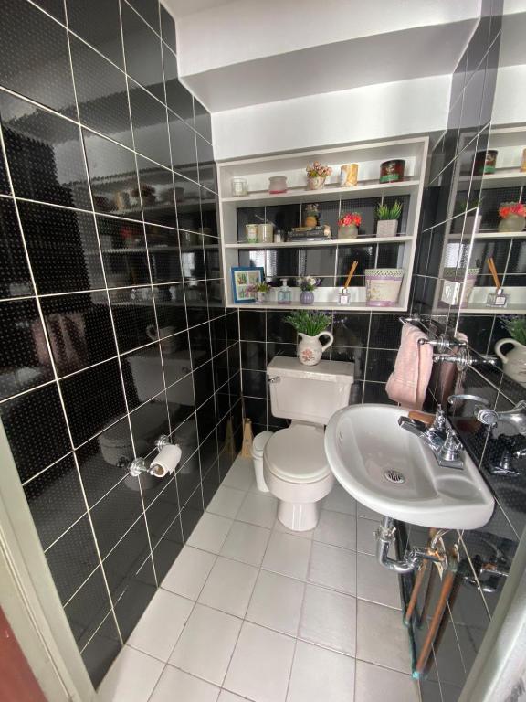 Koupelna v ubytování Habitación casa Andy