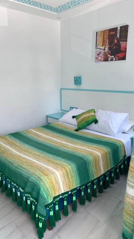 Postel nebo postele na pokoji v ubytování Hôtel Etoile de Mer