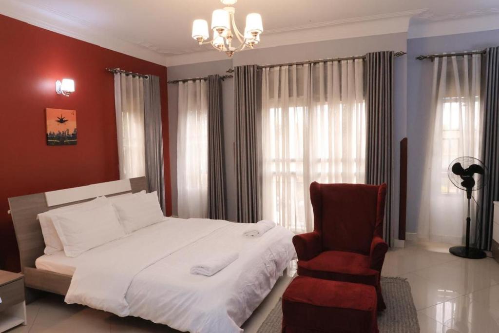 Postel nebo postele na pokoji v ubytování NCI Residence