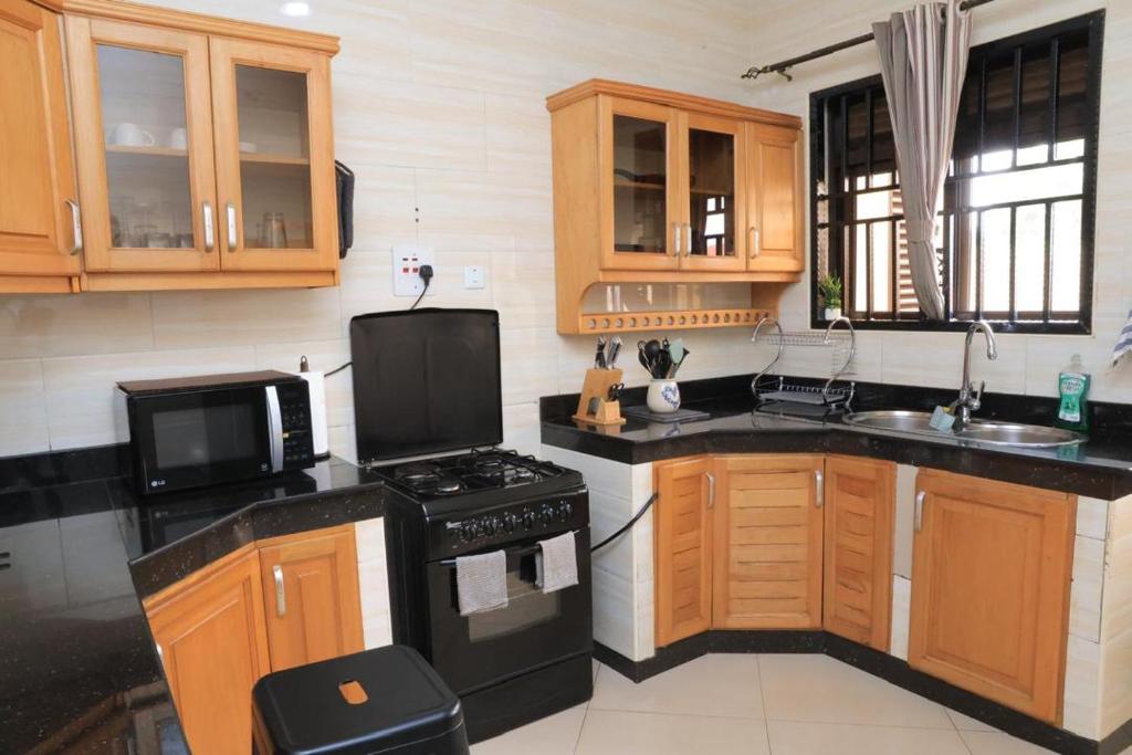 Kuchyň nebo kuchyňský kout v ubytování NCI Residence
