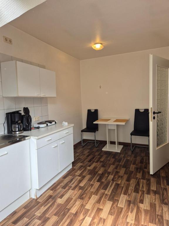 Kuchyň nebo kuchyňský kout v ubytování Hotel am Schenkelberg