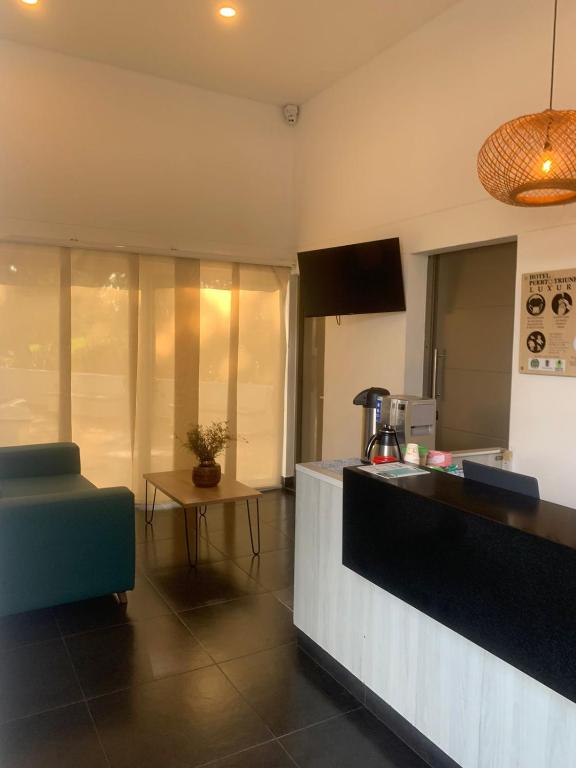 Kuchyň nebo kuchyňský kout v ubytování Hotel Puerto Triunfo