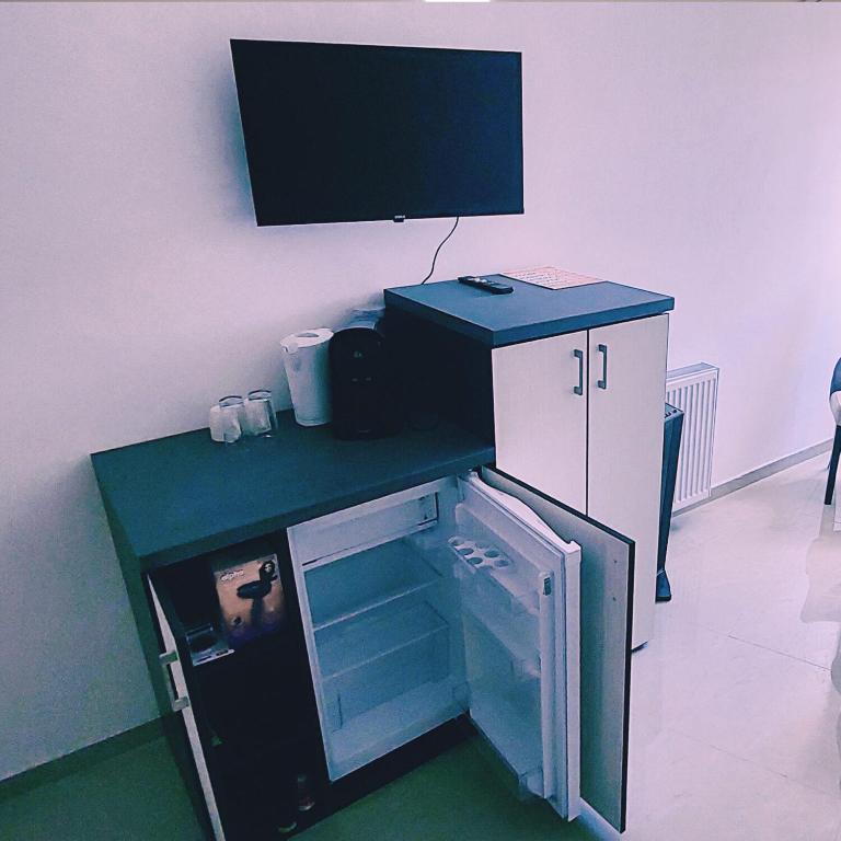 Kuchyň nebo kuchyňský kout v ubytování Fenix Apartments