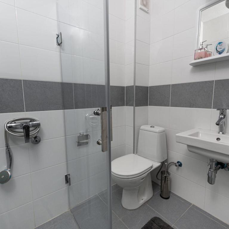 Koupelna v ubytování Fenix Apartments