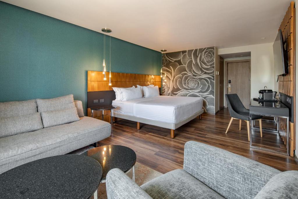 Postel nebo postele na pokoji v ubytování Hotel Real del Rio