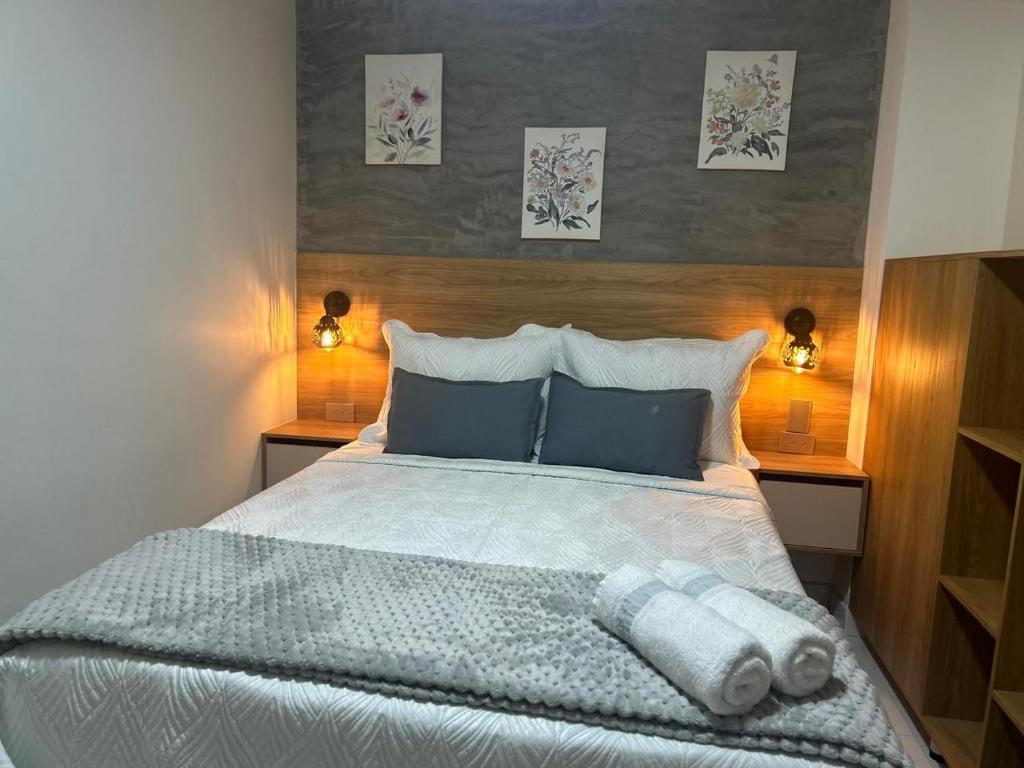 Postel nebo postele na pokoji v ubytování Provenza Medellin Hotel Boutique
