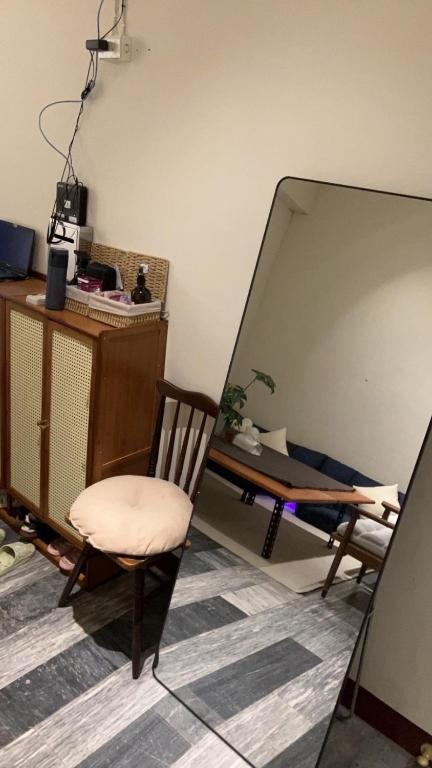 Kuchyň nebo kuchyňský kout v ubytování 阿霞袂睏MAMAzzzzHostel
