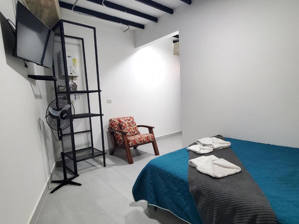 Postel nebo postele na pokoji v ubytování M1145 Aparta Loft