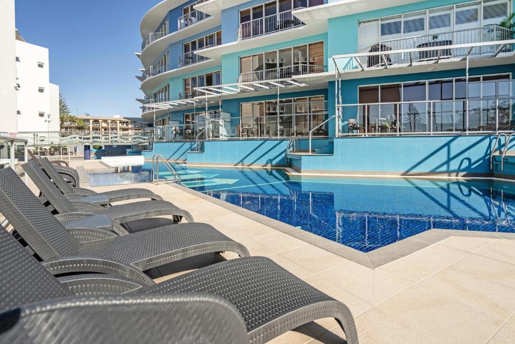 Bazén v ubytování Rolling Surf Resort nebo v jeho okolí