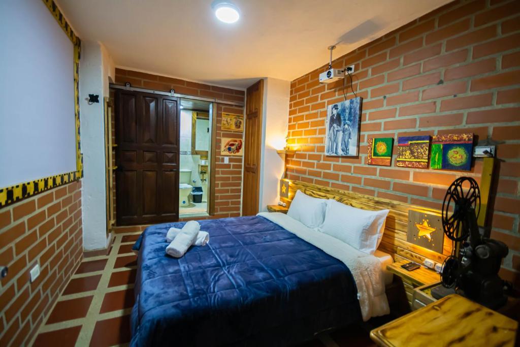 Postel nebo postele na pokoji v ubytování Hotel Spa Bliss Guatape