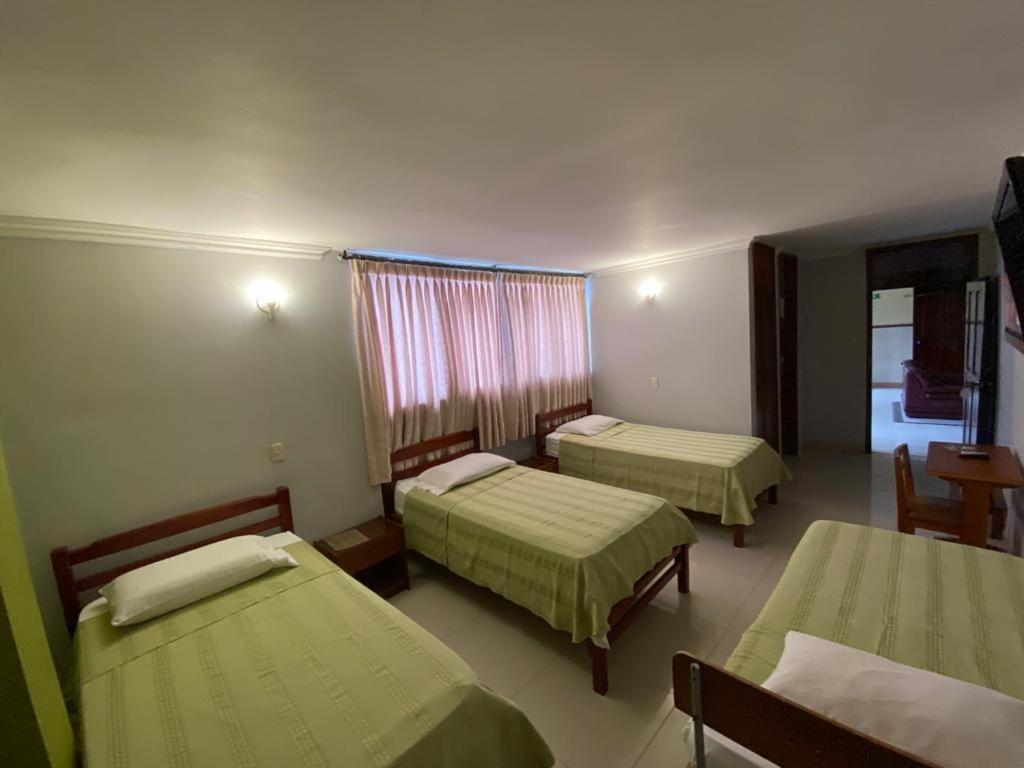 Hotel sanfrancisco de Asis - Quarto Quádruplo Com Vista Jardim