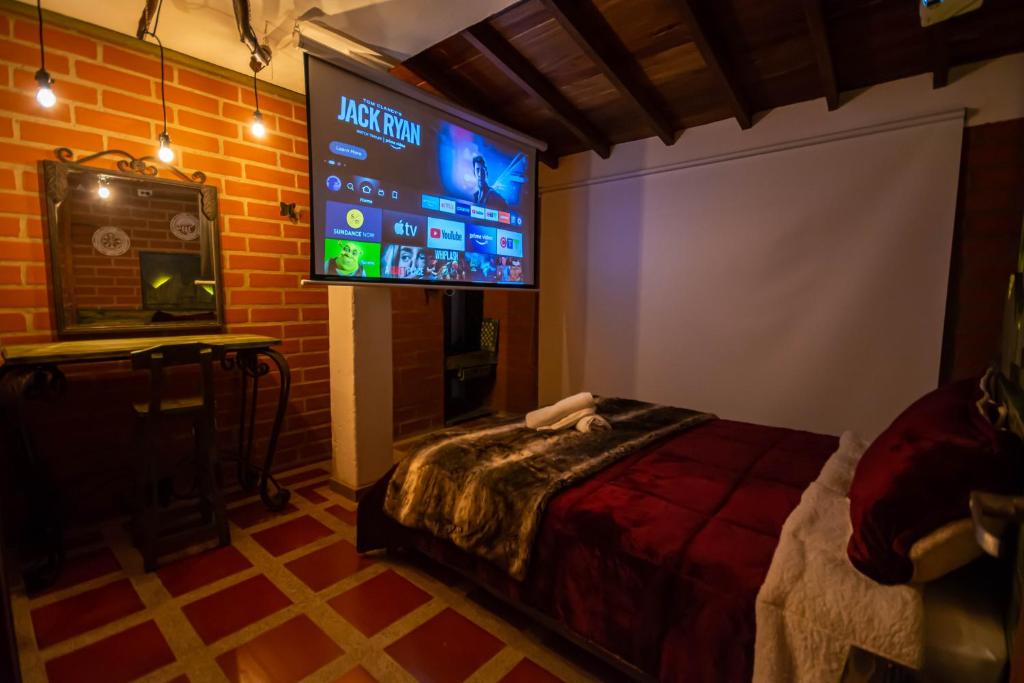 Postel nebo postele na pokoji v ubytování Hotel Spa Bliss Guatape
