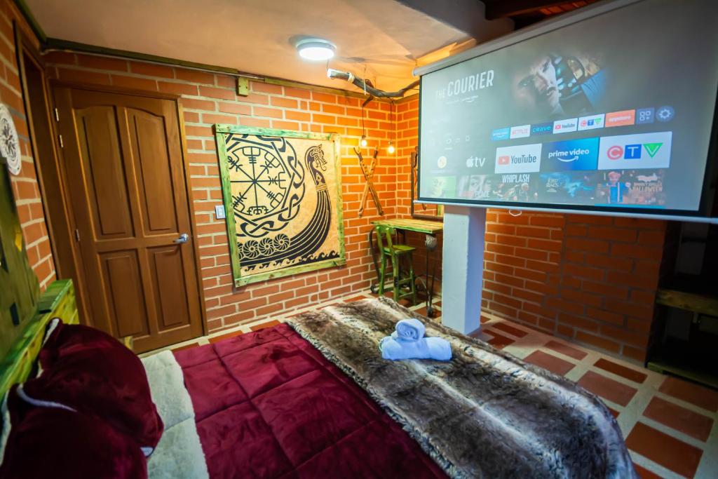 TV a/nebo společenská místnost v ubytování Hotel Spa Bliss Guatape