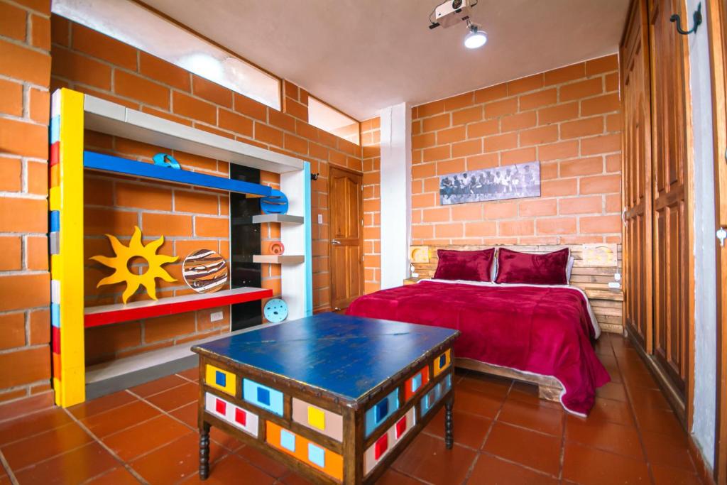 Postel nebo postele na pokoji v ubytování Hotel Spa Bliss Guatape