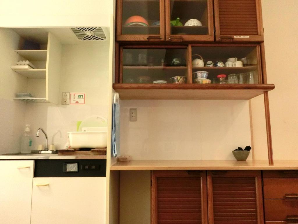 Kuchyň nebo kuchyňský kout v ubytování Kencha Rumah