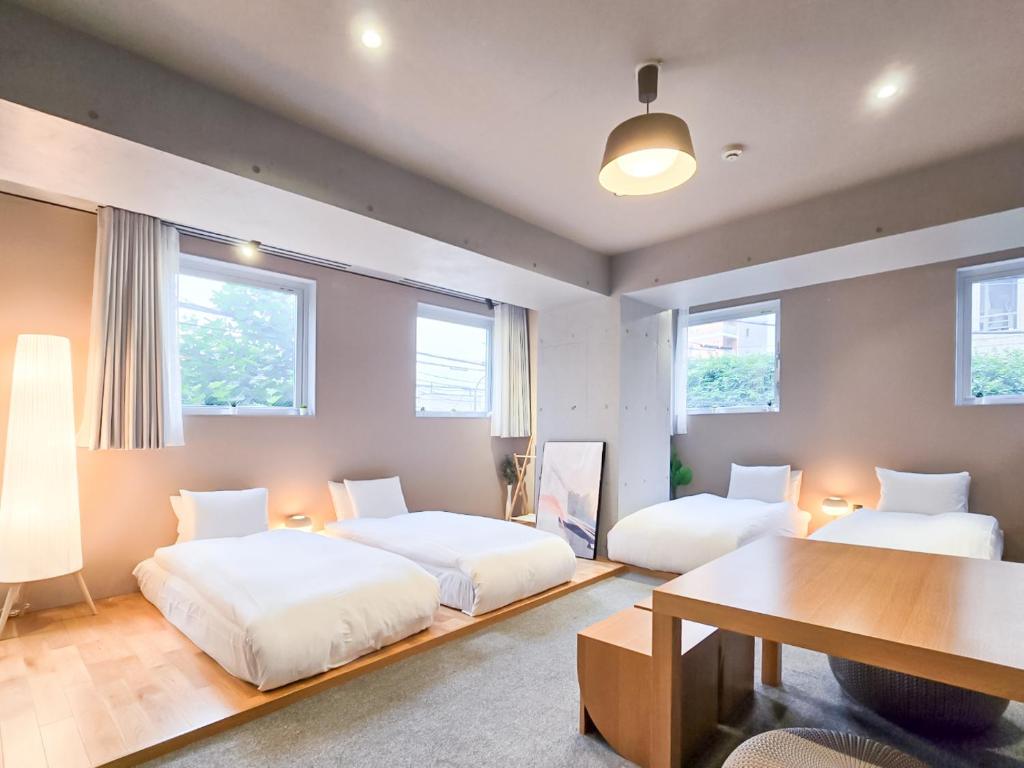 Postel nebo postele na pokoji v ubytování STAY ARI Apartment Hotel Shinjuku-Takadanobaba