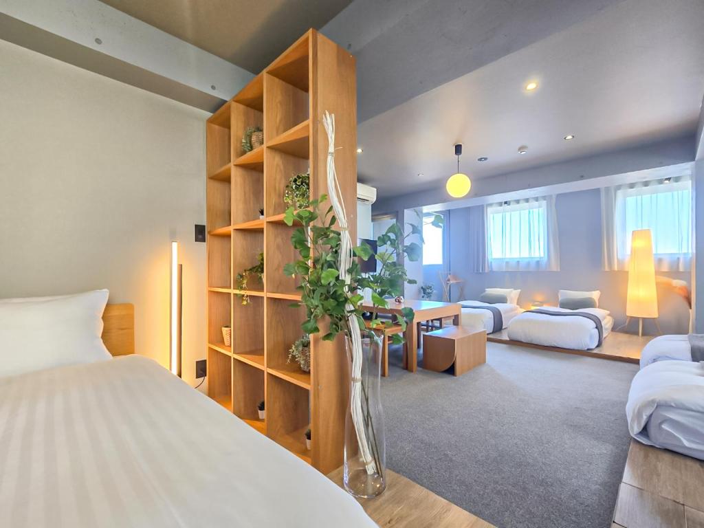 Postel nebo postele na pokoji v ubytování STAY ARI Apartment Hotel Shinjuku-Takadanobaba