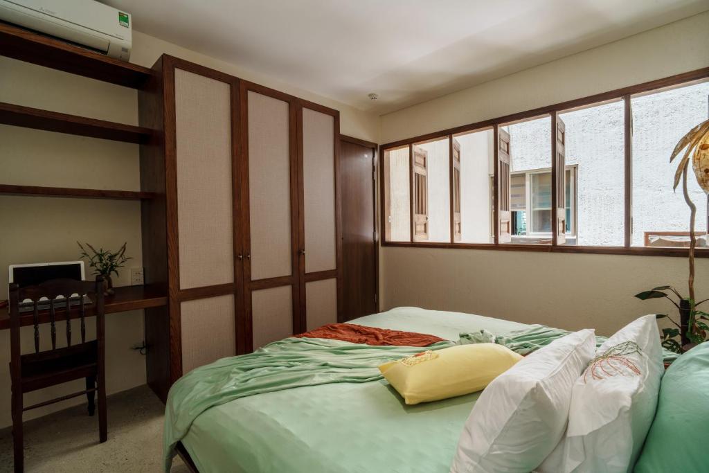 Postel nebo postele na pokoji v ubytování Camfusion House