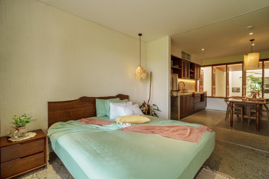 Postel nebo postele na pokoji v ubytování Camfusion House