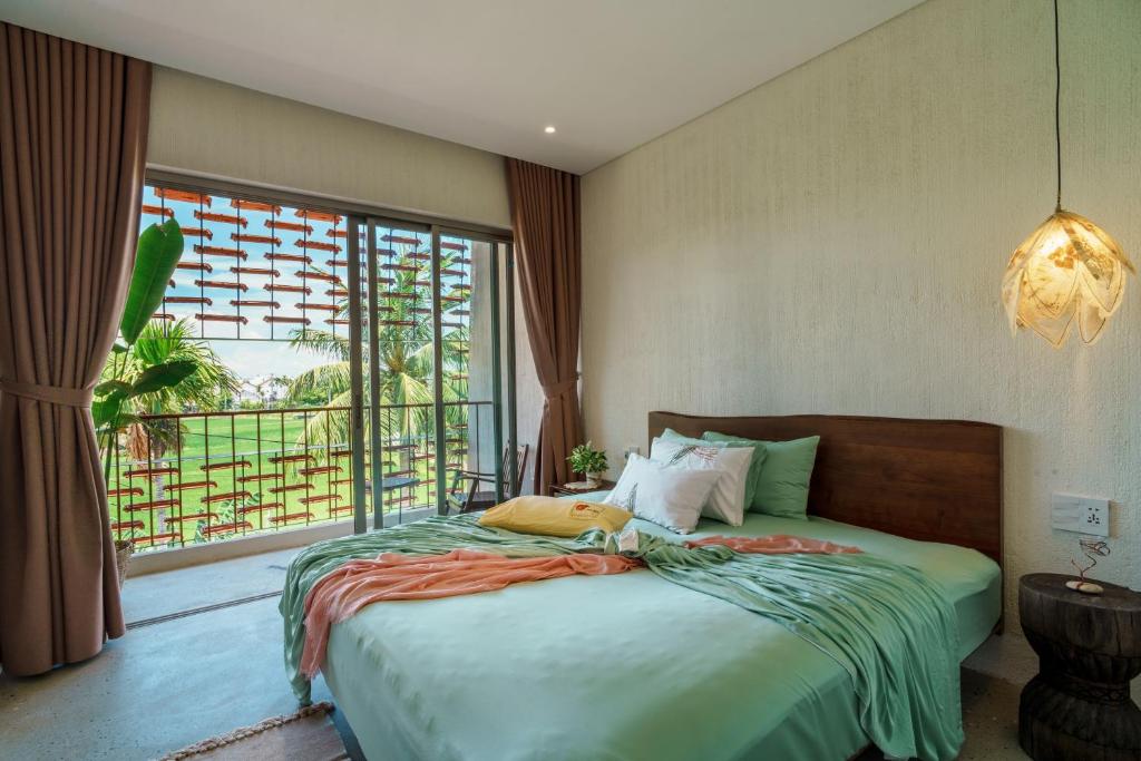Postel nebo postele na pokoji v ubytování Camfusion House