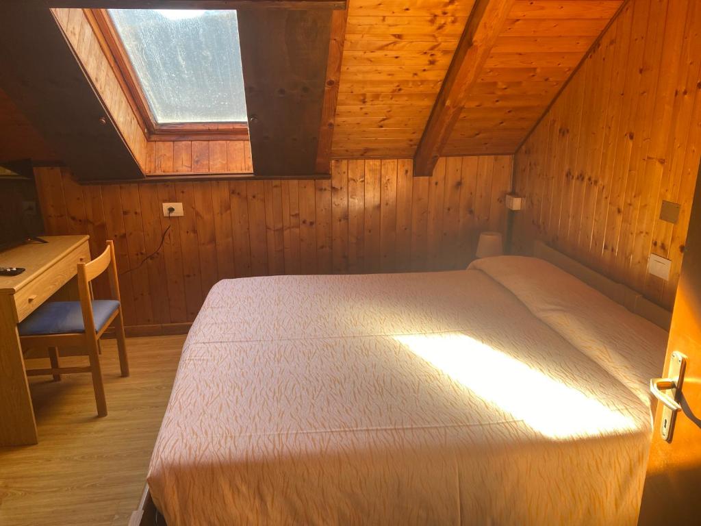 Postel nebo postele na pokoji v ubytování Albergo La Perla