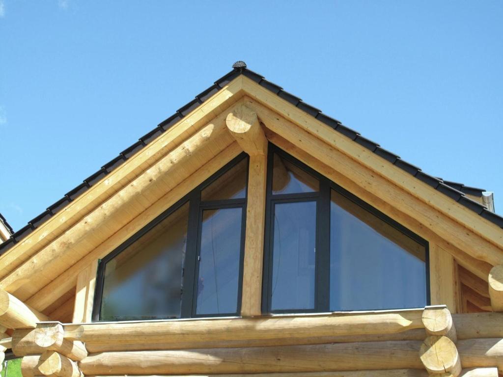 a window on the roof of a log cabin at Chalet in Ladis by Ski Slope & Sonnenbahn in Ladis