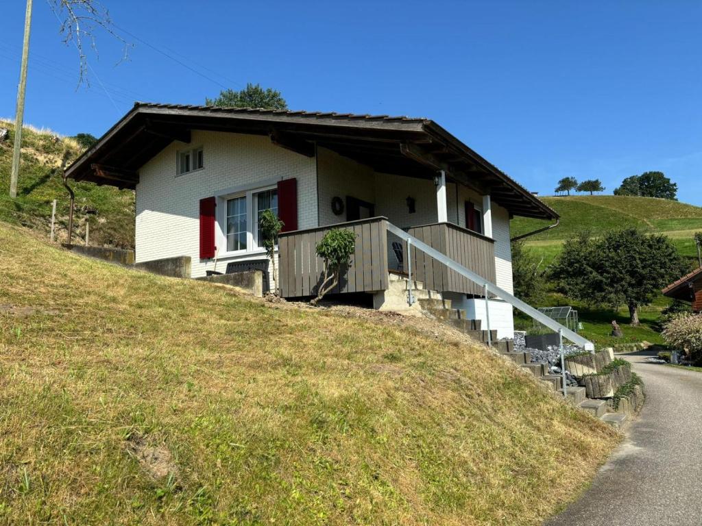 a house on the side of a hill at Ferienhaus im Naherholungsgebiet in Eriswil