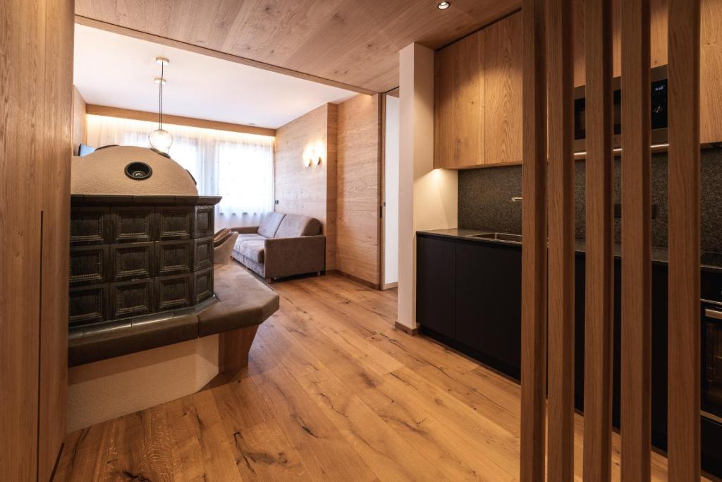 Postel nebo postele na pokoji v ubytování Aparthotel Zum Schlössl