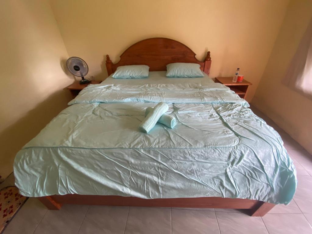 Voodi või voodid majutusasutuse Pondok rinjani bungalow tetebatu toas