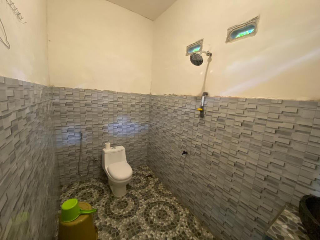 Vannituba majutusasutuses Pondok rinjani bungalow tetebatu