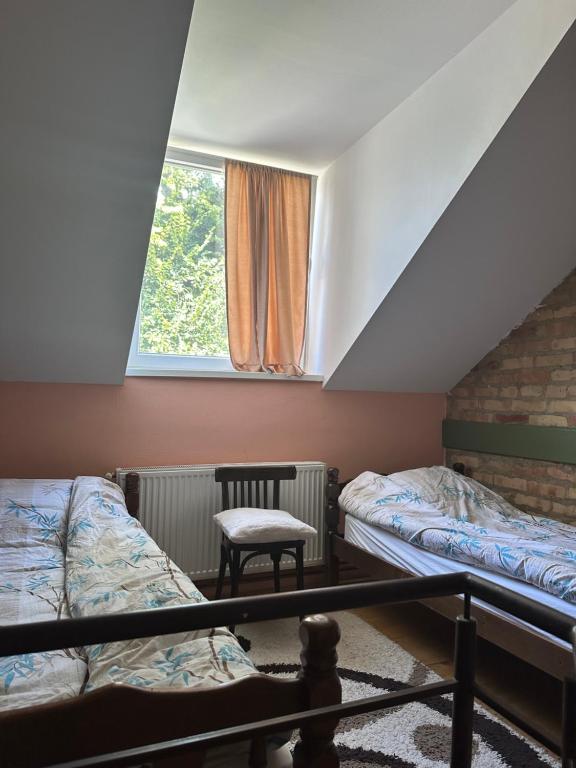 Postel nebo postele na pokoji v ubytování Guest house Pikec