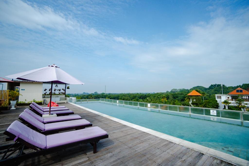 Bazén v ubytování The Evitel Resort Ubud nebo v jeho okolí