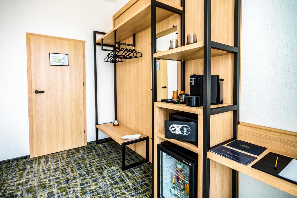 Kuchyň nebo kuchyňský kout v ubytování B1 City Hotel