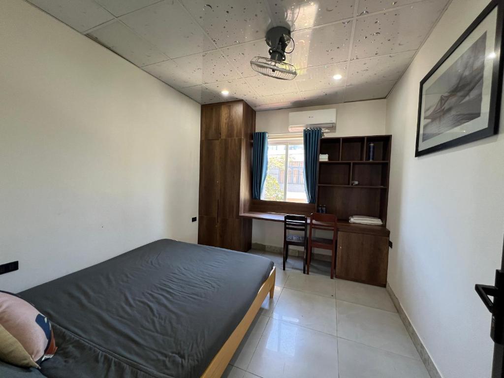 Postel nebo postele na pokoji v ubytování Vườn Gióng Homestay