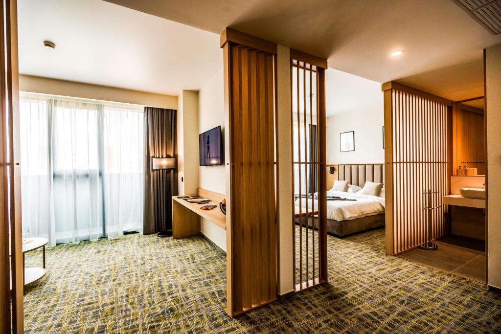 Postel nebo postele na pokoji v ubytování B1 City Hotel