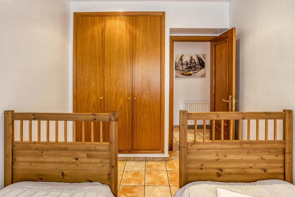 Postel nebo postele na pokoji v ubytování Fantastic Family Villa