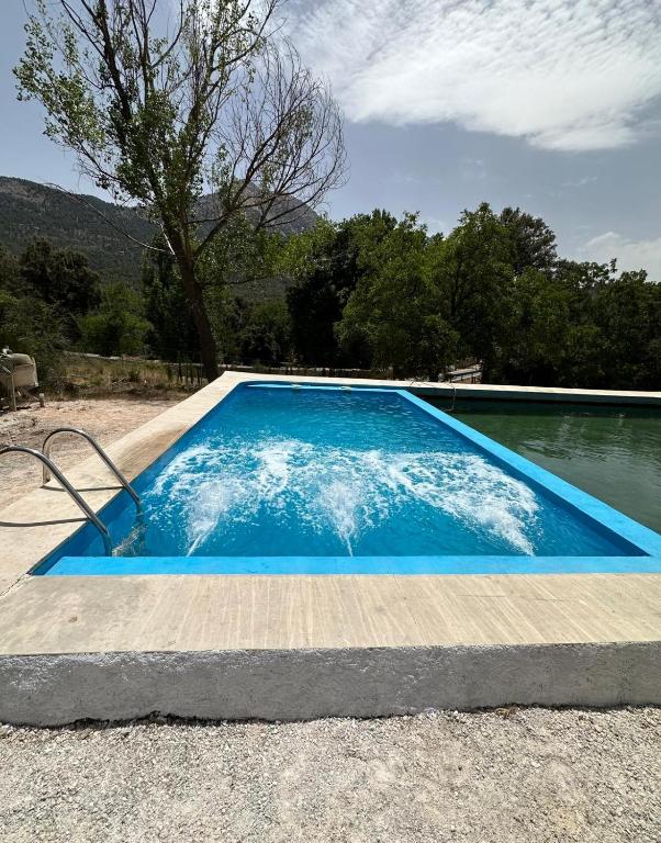 The swimming pool at or close to CORTIJO VIANA LA SAGRA