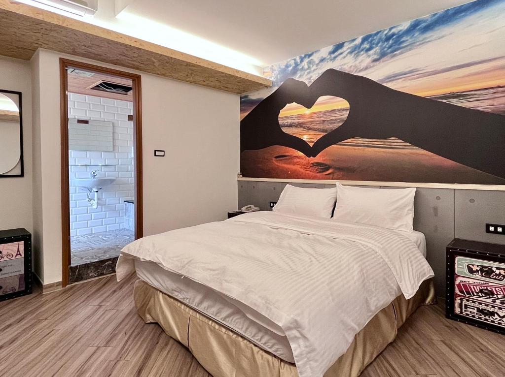 Postel nebo postele na pokoji v ubytování Good Time Boutique Hotel