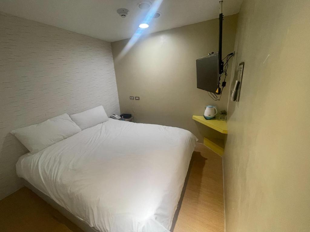 TV a/nebo společenská místnost v ubytování LaVita Hotel
