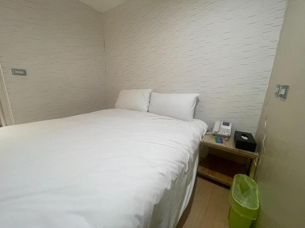 Postel nebo postele na pokoji v ubytování LaVita Hotel
