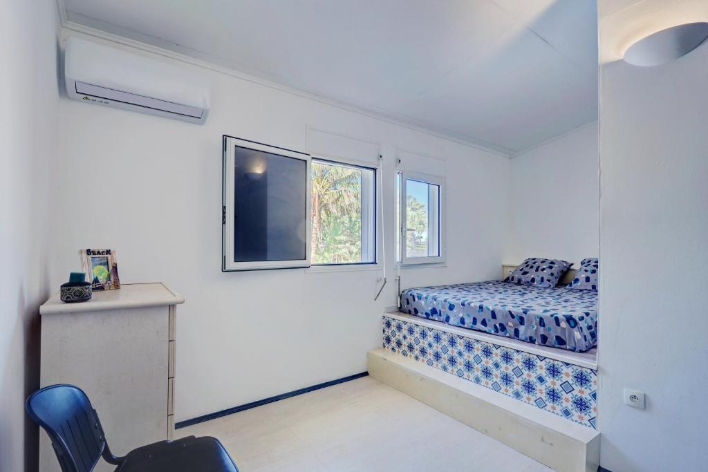 Postel nebo postele na pokoji v ubytování La Case Coco - Maison climatisée à Saint-Joseph