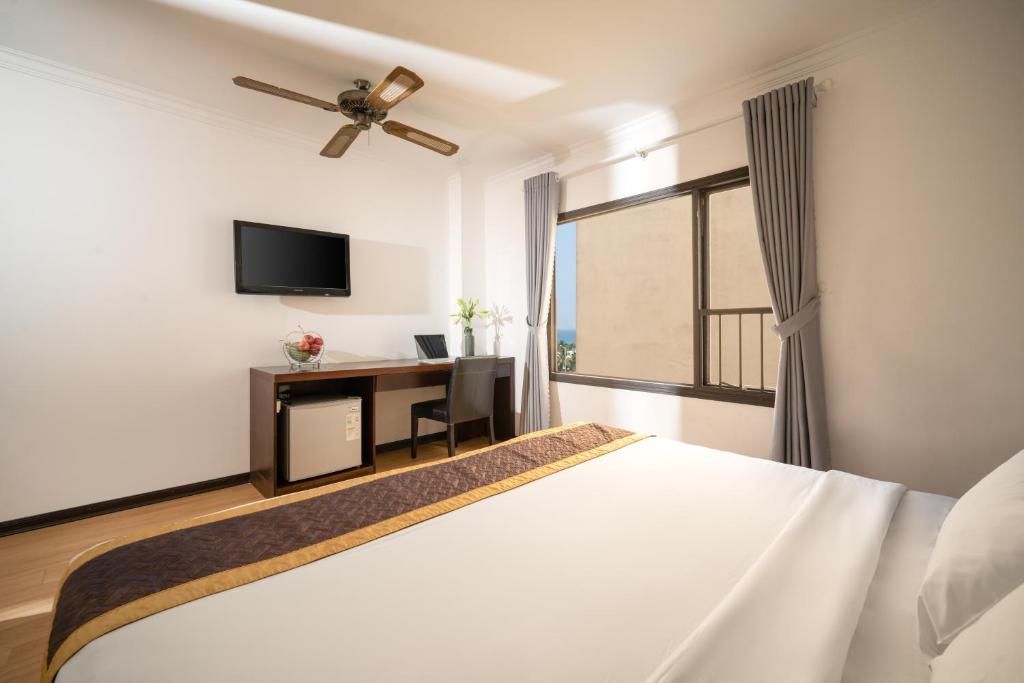 Postel nebo postele na pokoji v ubytování Zenta Sea View Hotel